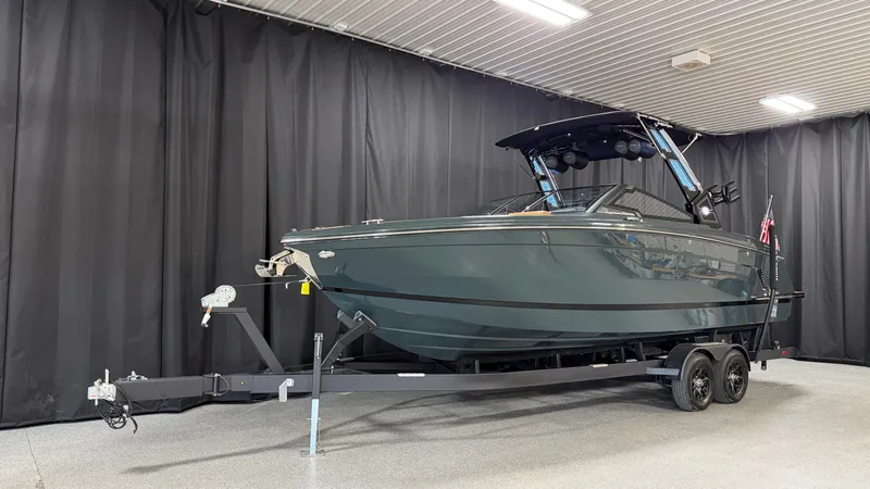 Slide: The Image of 2027 Cobalt R8 Surf in a showroom on a trailer. - 2
