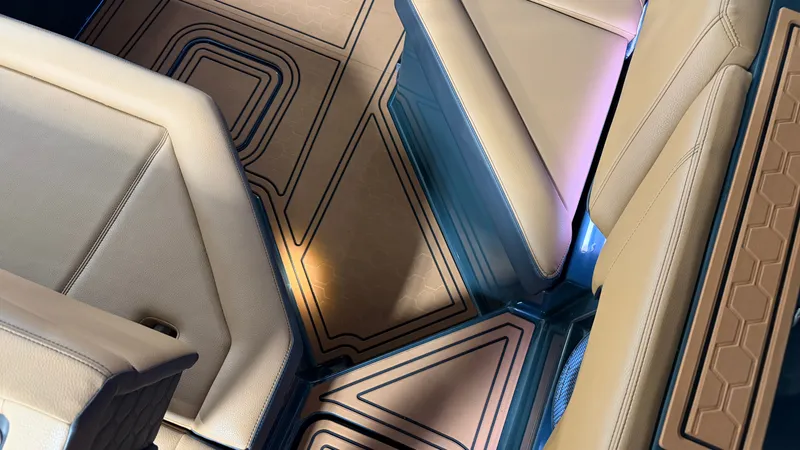 Slide: The Image of The interior of the 2027 Cobalt R8 Surf features modern geometric patterns and luxurious upholstery. - 24
