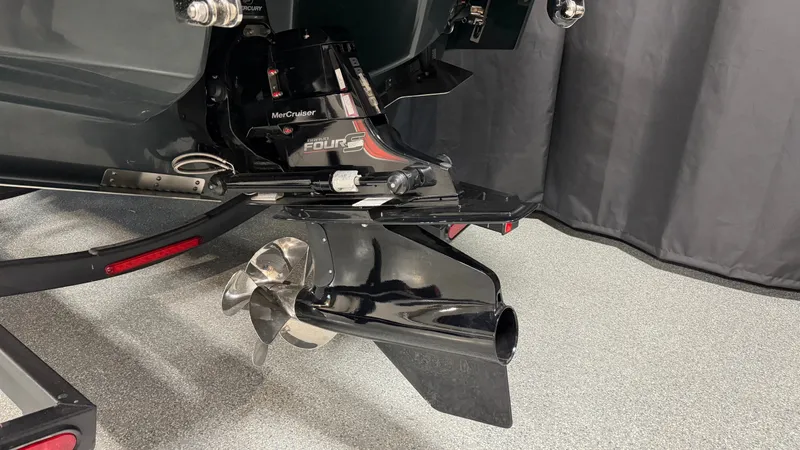 Slide: The Image of Close-up of a boat propeller and drive system in an indoor setting. - 8