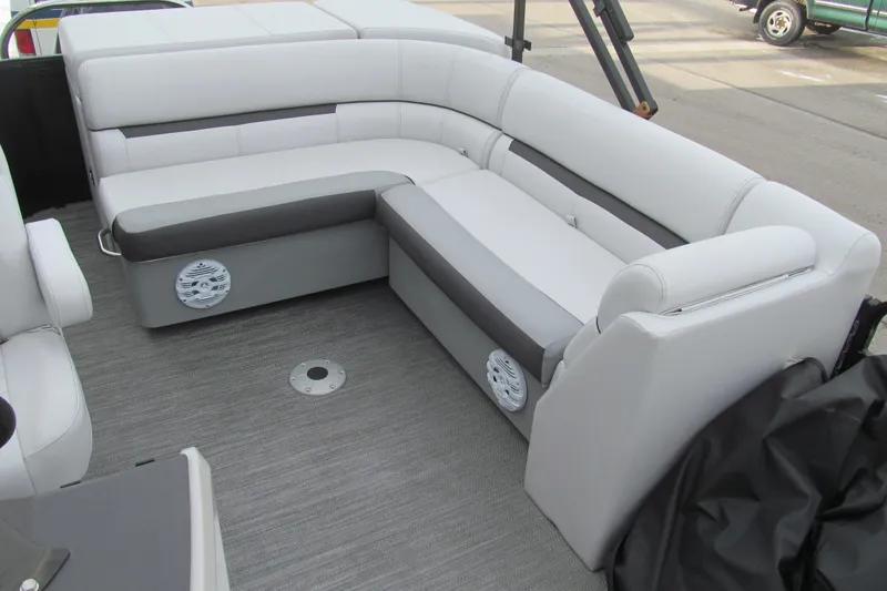 Slide: The Image of 2023 Godfrey Sweetwater 2286 C boat interior with gray and white seating. - 12