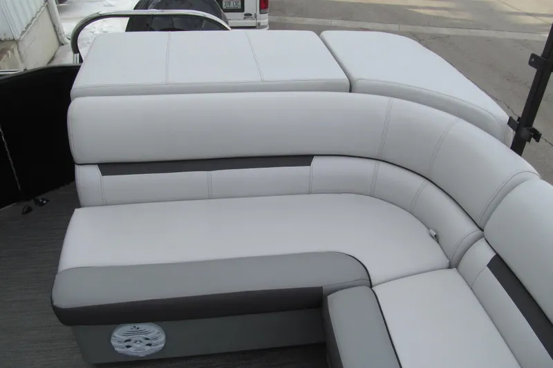 Slide: The Image of 2023 Godfrey Sweetwater 2286 C boat interior with plush seating and modern design. - 13