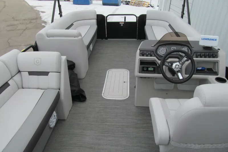 Slide: The Image of 2023 Godfrey Sweetwater 2286 C pontoon boat interior with modern seating and steering console. - 6