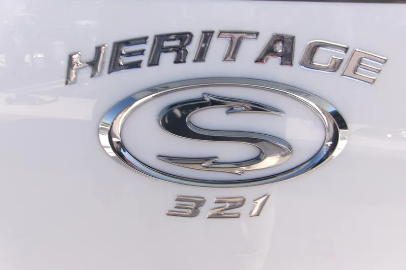 Slide: The Image of 2026 Sportsman Heritage 321 Center Console logo on white background. - 22