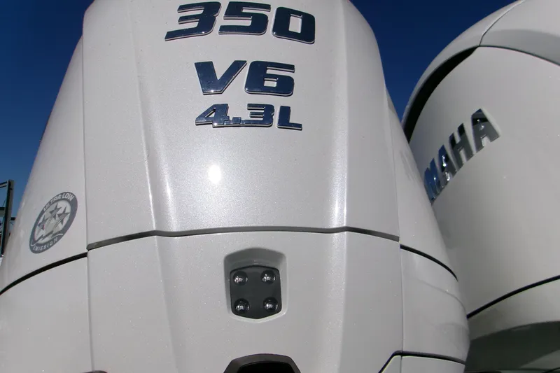 Slide: The Image of Yamaha 350 V6 4.3L engine on 2026 Sportsman Heritage 321 Center Console boat. - 23