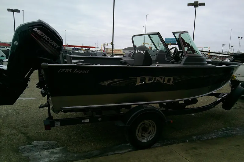 Slide: The Image of 2016 Lund 1775 Impact Sport boat with Mercury engine on trailer. - 3