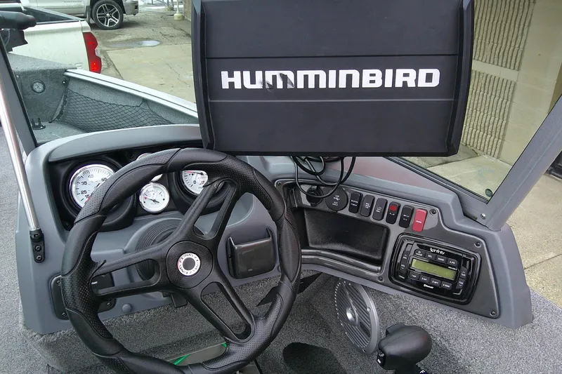 Slide: The Image of Dashboard of 2016 Lund 1775 Impact Sport boat with Humminbird fish finder. - 9