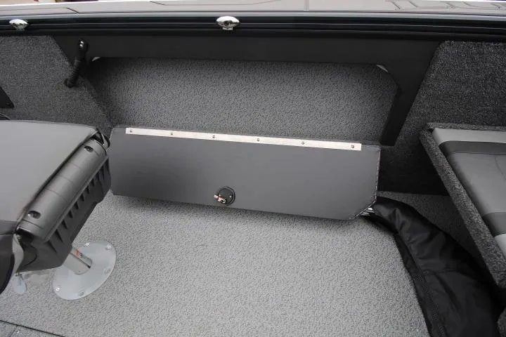 Slide: The Image of 2026 Lund 2075 Fisherman boat interior with seating and storage compartment. - 11