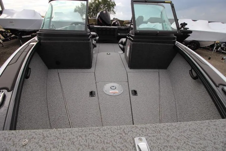 Slide: The Image of 2026 Lund 2075 Fisherman boat interior with spacious deck and windshield. - 5