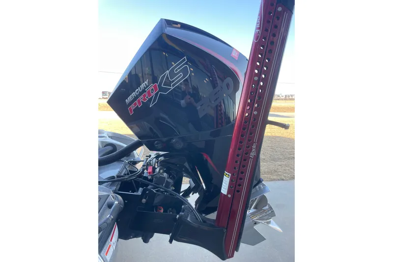 Slide: The Image of 2021 Nitro Z21 Pro boat with Mercury Pro XS engine, red power pole, outdoor setting. - 3