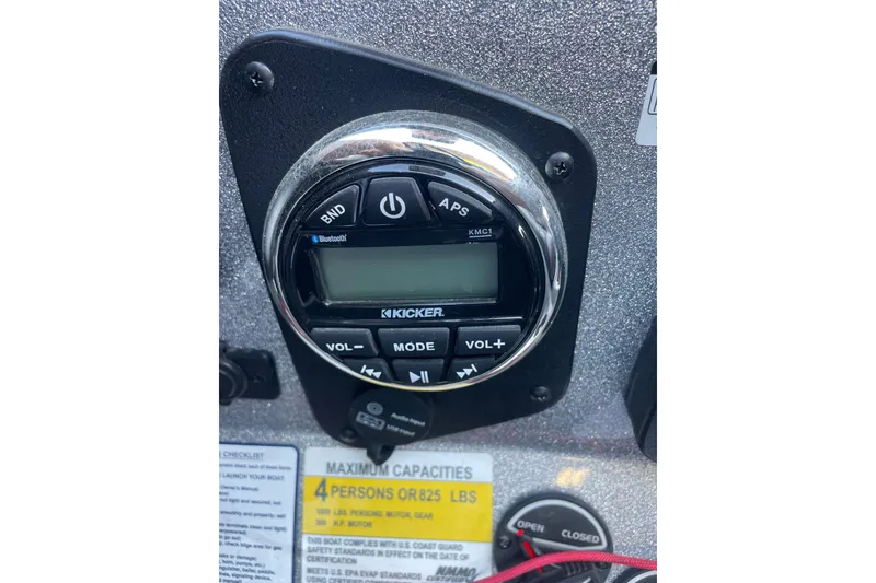 Slide: The Image of Kicker audio system on 2021 Nitro Z21 Pro boat dashboard, with capacity label. - 8