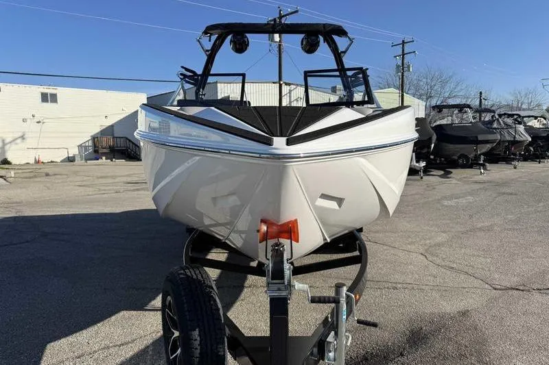 Slide: The Image of 2026 Moomba Craz boat on trailer in outdoor lot, front view. - 3