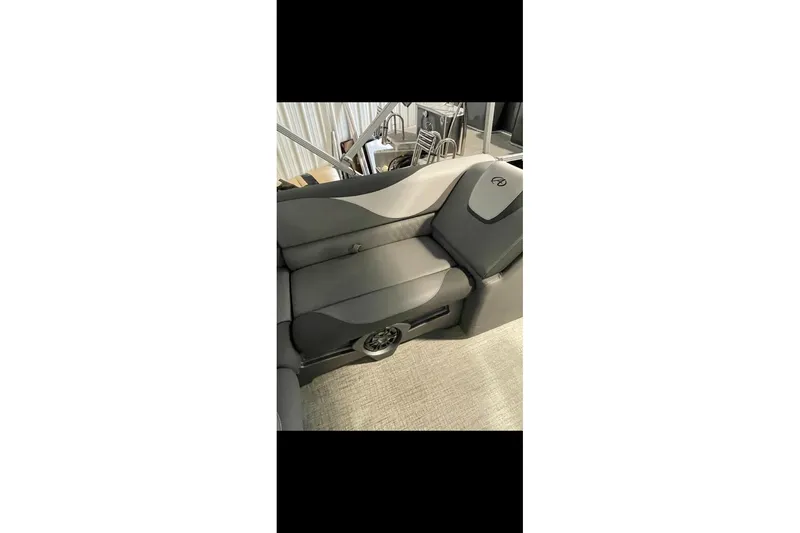 Slide: The Image of 2022 Avalon LSZ 2485 VRB boat interior with gray seating and modern design. - 24