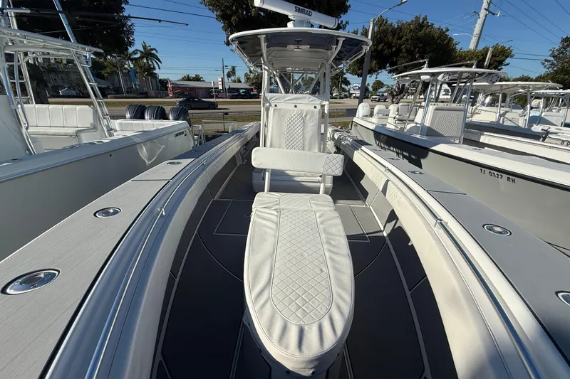 Slide: The Image of 2006 Contender 33 Tournament boat with spacious seating and modern design. - 12