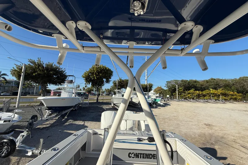 Slide: The Image of 2006 Contender 33 Tournament boat on trailer, viewed from rear, with clear blue sky. - 5