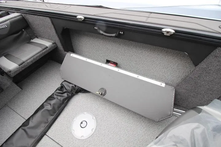 Slide: The Image of 2026 Lund 1875 Fisherman boat interior with storage compartment and seating. - 10