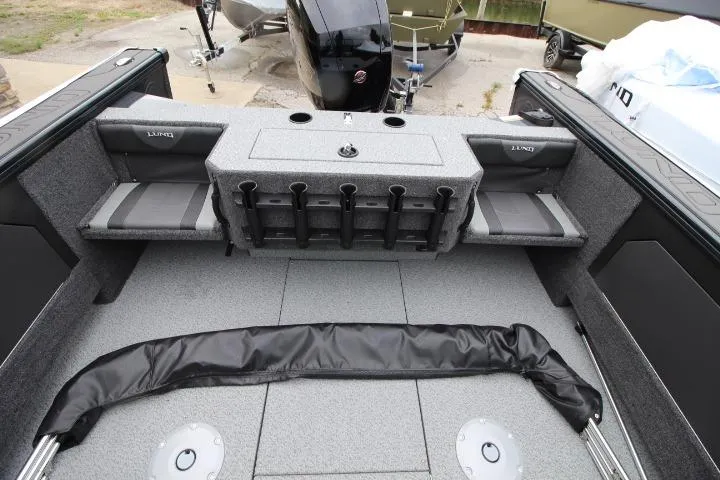 Slide: The Image of 2026 Lund 1875 Fisherman boat interior with rod holders and seating. - 13
