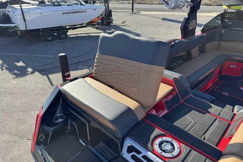 Slide: The Image of 2025 Supra SE boat interior with stylish seating and modern design features. - 12