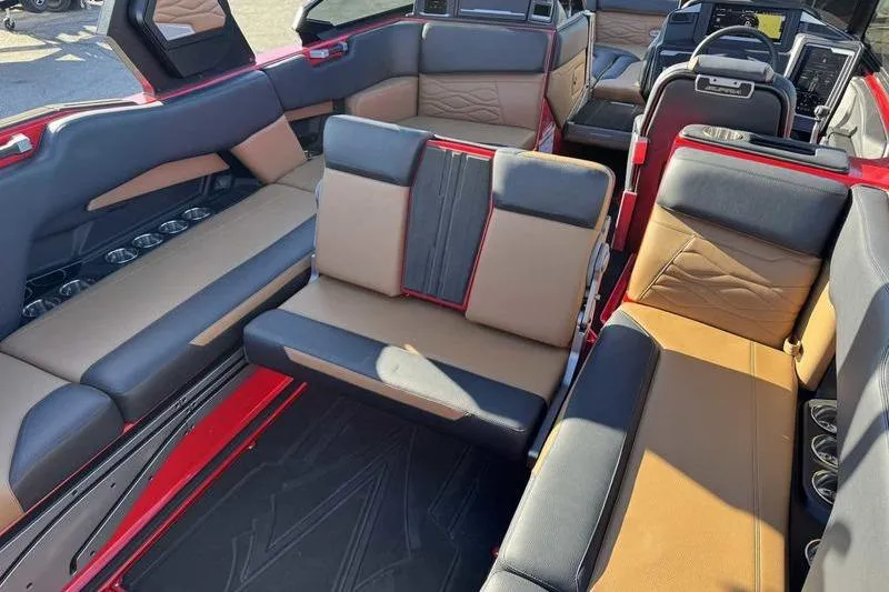 Slide: The Image of Luxurious interior of 2025 Supra SE boat with spacious seating and modern design. - 13