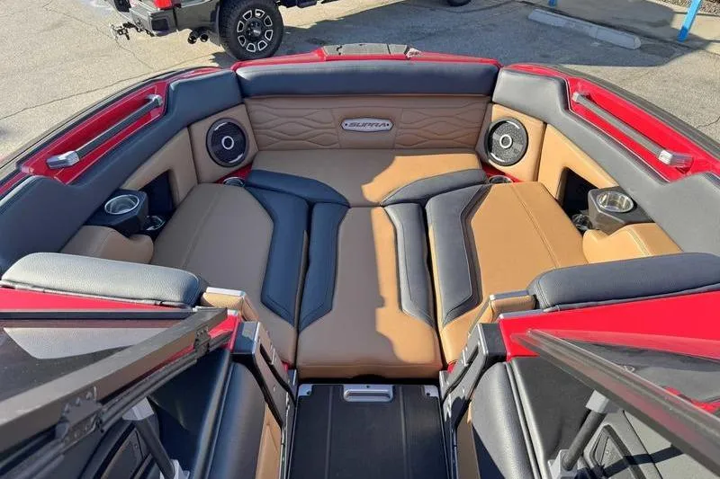 Slide: The Image of 2025 Supra SE boat interior with luxurious seating and integrated speakers. - 17