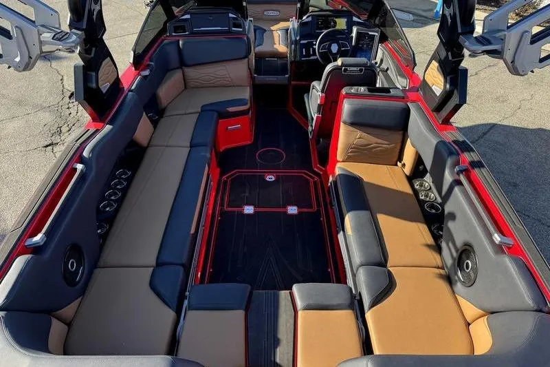 Slide: The Image of 2025 Supra SE boat interior with luxurious seating and modern dashboard design. - 8