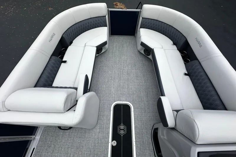 Slide: The Image of 2025 Harris Sunliner 230 pontoon boat interior with luxurious seating and modern design. - 4