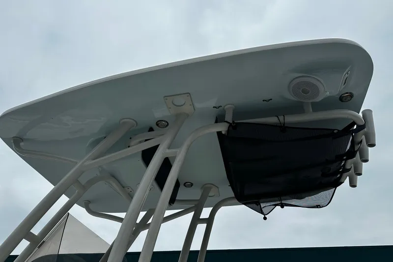 Slide: The Image of 2023 Key West 239 FS boat top view with speaker and storage net. - 12