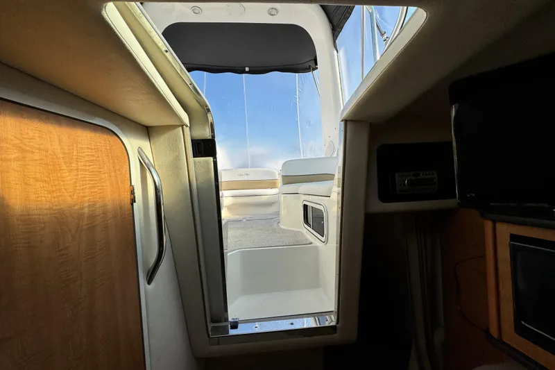 Slide: The Image of Interior view of 2006 Sea Ray Sundancer 280 cabin, showing entrance to deck area. - 24