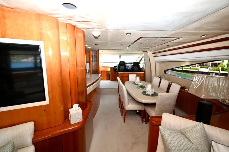 Slide: The Image of Luxurious interior of 2005 Sunseeker 82 Yacht with elegant dining area and modern decor. - 12