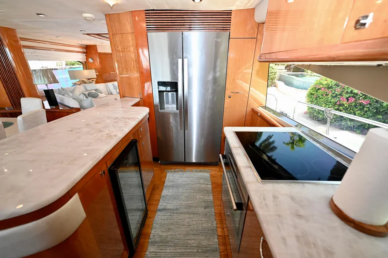 Slide: The Image of Luxurious kitchen interior of 2005 Sunseeker 82 Yacht with modern appliances and elegant design. - 16