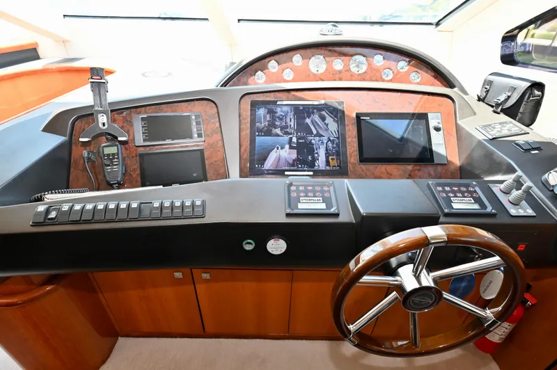 Slide: The Image of Control panel of a 2005 Sunseeker 82 Yacht with advanced navigation systems. - 20