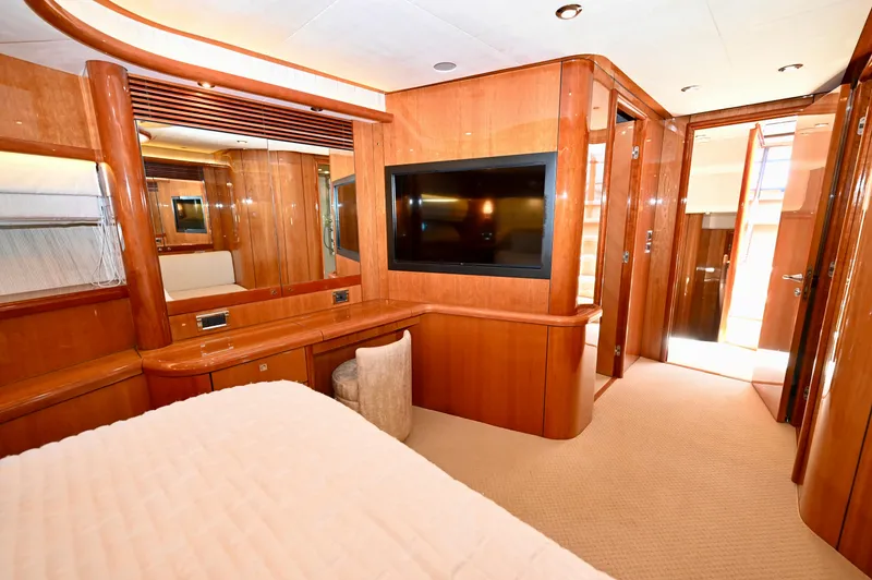 Slide: The Image of Luxurious interior of 2005 Sunseeker 82 Yacht with wood paneling and modern amenities. - 27