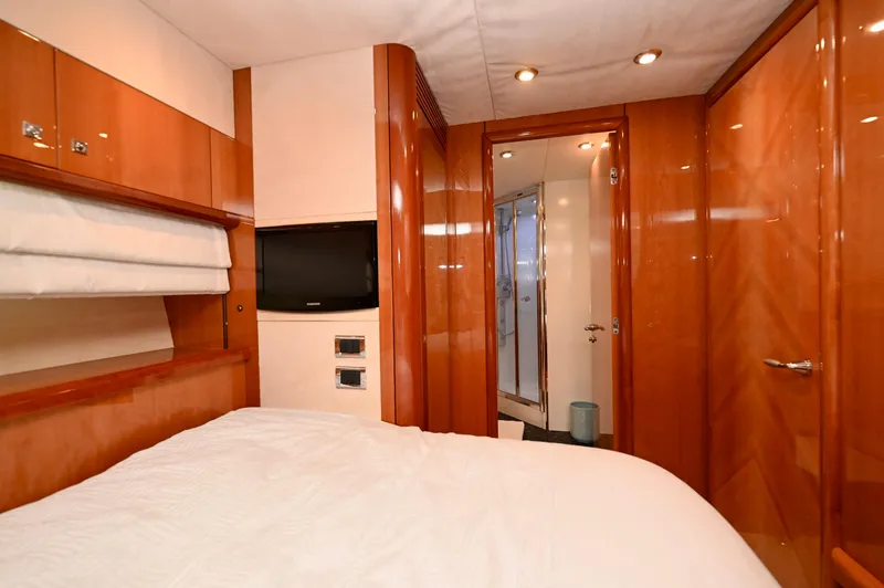 Slide: The Image of Luxurious cabin interior of 2005 Sunseeker 82 Yacht with wood paneling and modern amenities. - 38