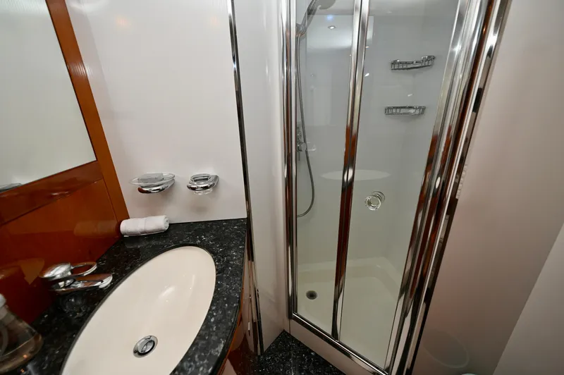 Slide: The Image of Luxurious bathroom on 2005 Sunseeker 82 Yacht with sleek shower and elegant sink. - 40