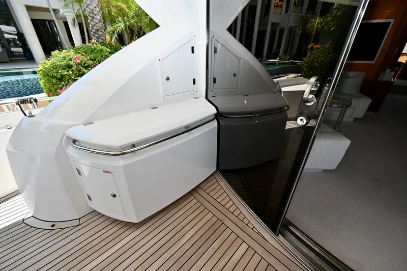 Slide: The Image of Luxurious Sunseeker 82 Yacht 2005 deck with sleek design and modern amenities. - 9