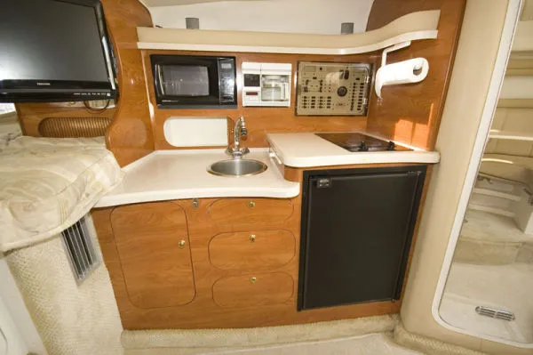 Slide: The Image of Rinker 310 Express 2003 - 4