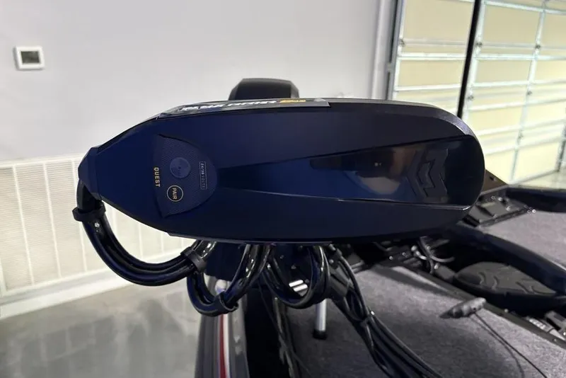 Slide: The Image of 2026 Phoenix 20 XE boat motor in a garage setting. - 15