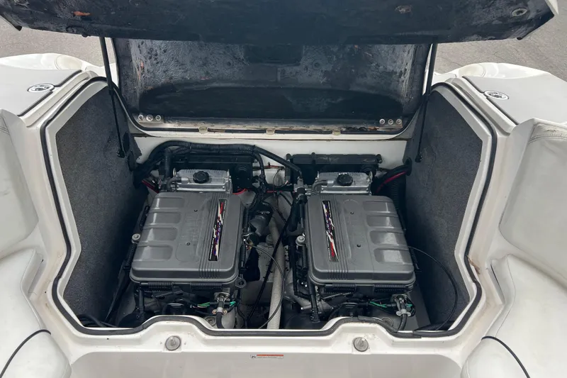 Slide: The Image of 2006 Yamaha Boats SX230 HO engine compartment with dual engines visible. - 11