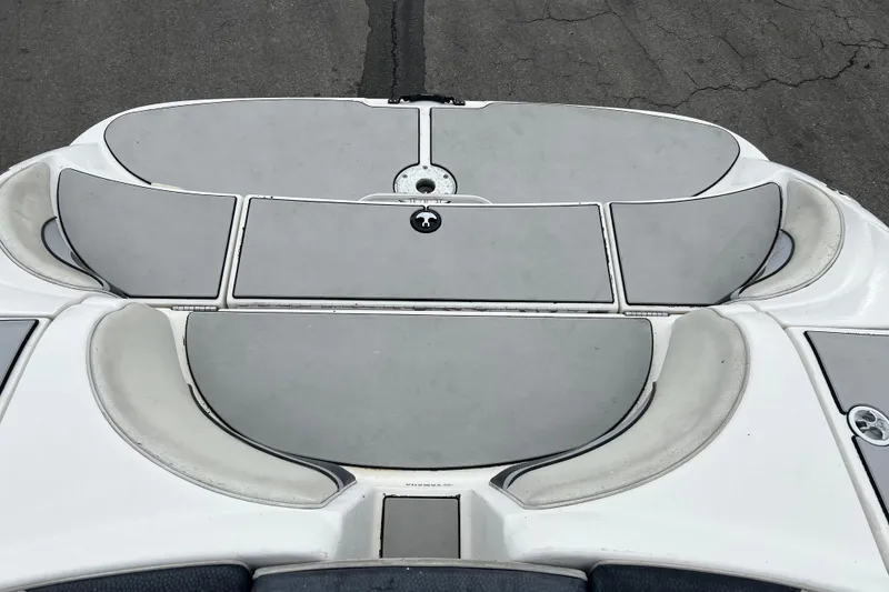 Slide: The Image of 2006 Yamaha Boats SX230 HO swim platform with cushioned seating and storage compartments. - 29