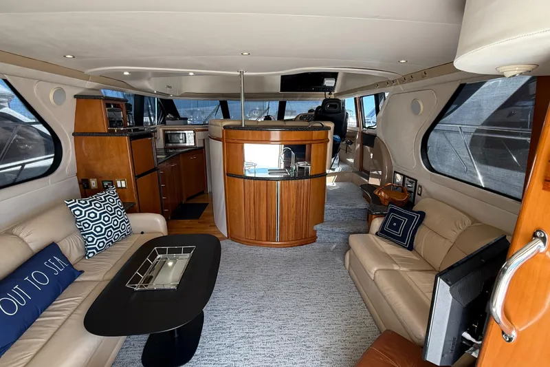 Slide: The Image of Luxurious interior of 2000 Carver 450 Voyager Pilothouse yacht with modern amenities. - 17