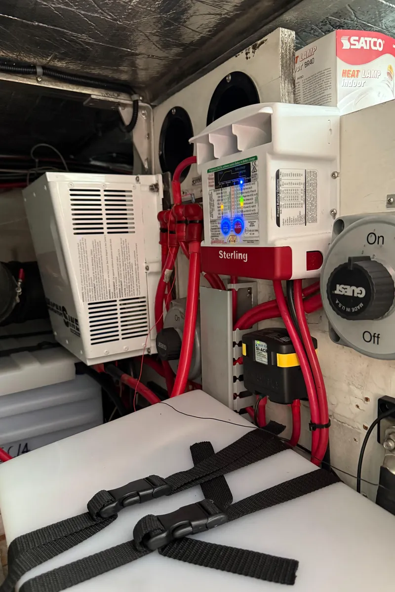 Slide: The Image of Electrical system inside a 2000 Carver 450 Voyager Pilothouse, featuring Sterling components. - 45