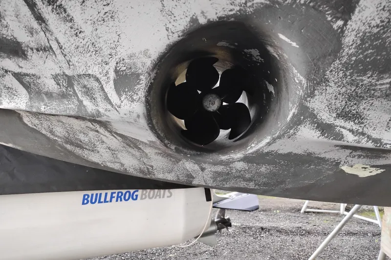 Slide: The Image of Bow thruster of 2000 Carver 450 Voyager Pilothouse, with Bullfrog Boats branding visible. - 48