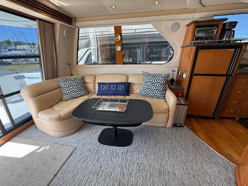 Slide: The Image of Luxurious interior of 2000 Carver 450 Voyager Pilothouse with plush seating and modern decor. - 6