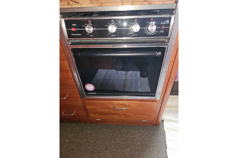 Slide: The Image of Garmin navigation system on 1989 Tollycraft Sport Sedan boat dashboard. - 13