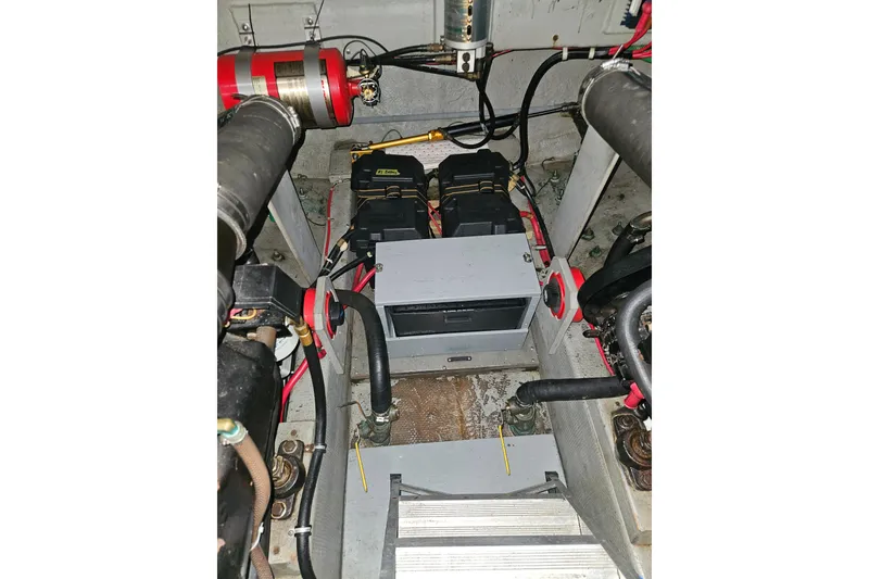 Slide: The Image of Engine compartment of a 1989 Tollycraft Sport Sedan with MerCruiser components. - 26