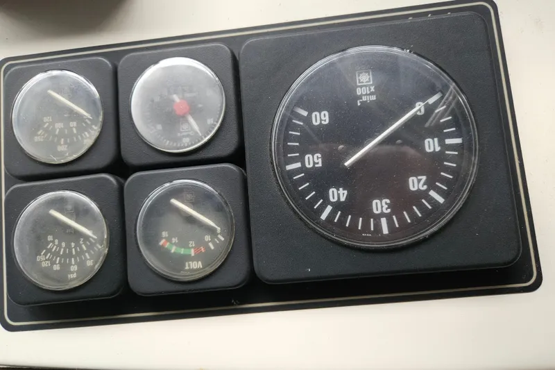 Slide: The Image of 1989 Tollycraft Sport Sedan docked in a marina, viewed from the cabin. - 8