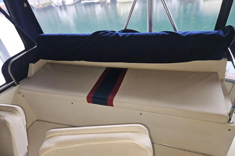 Slide: The Image of Dashboard gauges of a 1989 Tollycraft Sport Sedan boat, displaying various engine metrics. - 9