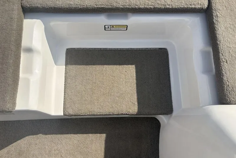 Slide: The Image of 2024 ProCraft 185 Pro boat interior with carpeted flooring and seating area. - 14