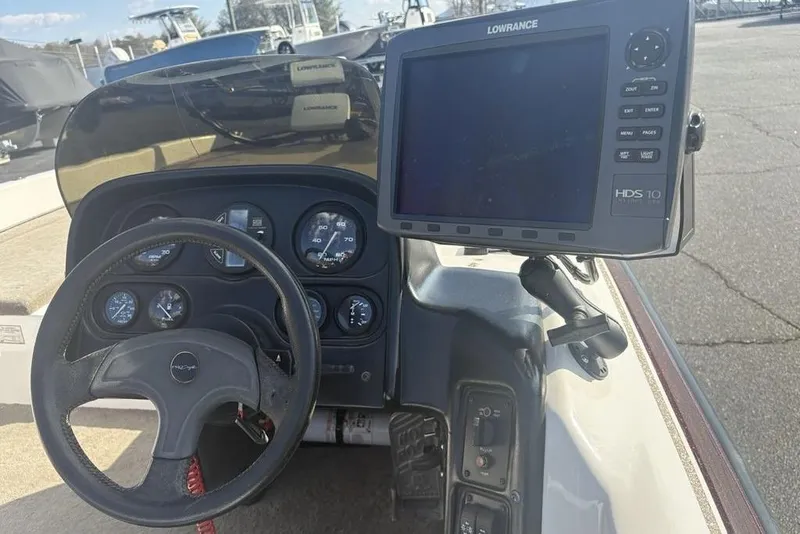 Slide: The Image of 2024 ProCraft 185 Pro boat dashboard with steering wheel and Lowrance HDS-10 display. - 20