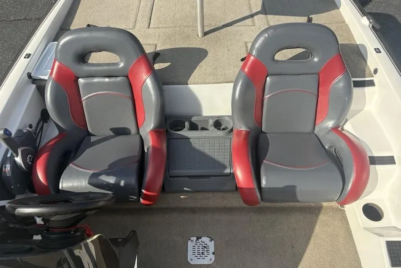 Slide: The Image of 2024 ProCraft 185 Pro boat interior with dual red and gray seats. - 21
