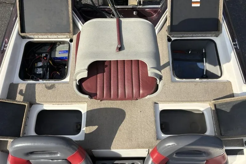 Slide: The Image of 2024 ProCraft 185 Pro boat interior with open storage compartments and seating. - 30